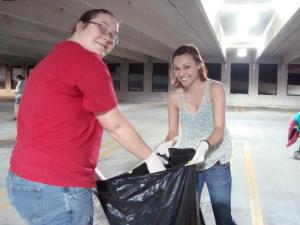 Students picking up trash at last semester's parking deck clean up!
